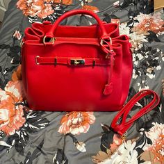 Nwt! Never Used. Beautiful Red Bag! Send Me An Offer! Comes With A Shoulder Strap. Has A Small Scratch Under Gold Belt (Pictured) But You Can’t Really Tell While Wearing It. Red Satchel Shoulder Bag With Removable Pouch, Red Square Satchel With Top Carry Handle, Red Rectangular Satchel With Top Carry Handle, Red Rectangular Satchel With Gold-tone Hardware, Crossbody Clutch Purse, High-end Red Shoulder Bag With Top Carry Handle, Red Satchel, Gold Belt, Travel Handbags