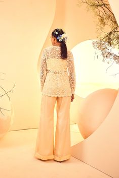 Featuring a pearlwork hand-embroidered jacket with flared pants. It comes with a bralet From Aneesh Agarwaal's Naksh collection. DELIVERY TIMEPlease allow 8-12 weeks for your outfit to arrive. FABRIC DETAILSPants, Satin Organza, Jacket-Tulle Professional cleaning only. Glamorous Evening Sharara With Pearl Embroidery, Glamorous Long Sleeve Sets For Eid, Designer Long Sleeve Festive Pant Set, Bollywood Style Sharara With Pearl Embroidery For Evening, Bollywood Style Evening Sharara With Pearl Embroidery, Anarkali Style Long Sleeve Pant Set With Chikankari Embroidery, Anarkali Pant Set With Resham Embroidery, Anarkali Pant Set With Resham Embroidery And Long Sleeves, Glamorous Pearl Embroidery Sets For Eid