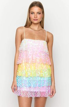 Rainbow sparkle mini dress

How to style:
Shine bright in our Darcy Rainbow sparkle mini dress ()! The perfect dress for your next concert or birthday! Dress up your look with some heels () or pair with cowboy boots () for a cool and comfy fit. Add some silver jewellery and a simple clutch to complete the look! 

Features:


  
 * Mini length 
 * Light weight material 
 * Fully lined 
 * Mesh outer with sequins  
 * Spaghetti straps with tie back feature  
 * Slight stretch  
 * Tiered rainbow d Rainbow Sequined Party Dress, Disco Style Multicolor Sequined Mini Dress, Multicolor Sequined Disco Mini Dress, Iridescent Summer Mini Dress, Rainbow Sequin Mini Dress, Simple Clutch, Sparkle Mini Dress, Rainbow Sparkle, 60's Dress