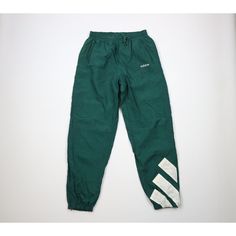 Vtg 90s Adidas Mens Medium Spell Out Big Logo Lined Nylon Joggers Pants Green Mens Pants Blemishes front right, waistband, back left. Inner bottom lining is ripped and has blemishes Mens size Medium Measurements are: 14 inches across the waist laid flat 32 inch inseam 43 inches from top to bottom Green Nylon US Shipping is FREE Canada is $15 and International is $24 Check out my other items in my store! PR1491 Green Nylon Sporty Parachute Pants, Green Nylon Parachute Pants For Streetwear, Sporty Green Full-length Parachute Pants, Green Sporty Parachute Pants, Green Full-length Parachute Pants For Streetwear, 90s Style Sports Pants With Pockets, Green Parachute Pants For Streetwear, 90s Sporty Pants With Pockets, Green 90s Style Streetwear Bottoms