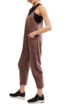 Keep it casual and relaxed in this slouchy jumpsuit designed in a baggy fit with handy pockets. 53" length; 23 1/2" inseam; 16 1/2" leg opening (size Medium) Pull-on style V-neck Racerback Back zip pocket; front patch pockets 95% cotton, 5% elastane Dry clean or machine wash, tumble dry Imported Oversized Cotton Jumpsuits And Rompers With Pockets, Oversized Cotton Jumpsuits And Rompers Casual, Oversized Cotton Jumpsuits And Rompers For Casual Wear, Casual Baggy Jumpsuits And Rompers With Pockets, Casual Oversized Jumpsuits And Rompers For Fall, Baggy Overalls With Side Pockets, Relaxed Fit Overalls With Pockets For Fall, Fall Overalls With Pockets And Relaxed Fit, Fall Relaxed Fit Overalls With Pockets