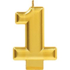 a gold number one candle on a white background