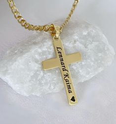 Our engraved gold Crosses are available with a range of chain lengths and different style. Our Gold Crosses have won praise from customers around the world. Check out our customer reviews. ITEM DETAILS: - 14 k gold over Sterling silver Cross. - 14 k gold filled and gold over sterling silver chains to be chosen from drop down menu. Need charms? http://etsy.me/1Njb7NM Classic Crosses  http://etsy.me/1JZ3tah Celtic Crosses  http://etsy.me/1Le9a5C Browse shop: https://www.MCACrossesJewelry.etsy.com It will be sent in a small gift box, silver or white. Chain drop down: Top chain Gold filled rolo    Middle chain Gold filled cable   Bottom chain Gold filled rope    Thank you very much for visiting our store. Personalized Gold Jewelry For Memorial, Engraved Cross Necklace For Commemoration, Personalized Engraved Cross Necklace, Gold Engraved Necklaces For Father's Day, Customizable Cross Pendant Jewelry As Gift, Gold Cross Pendant Necklace For Memorials, Gold Nameplate Jewelry For Keepsake, Gold Cross Pendant Necklace For Memorial, Gold Cross Jewelry For Valentine's Day