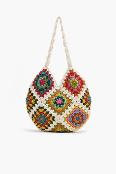 Shoulder bag Crochet Top Handle Colorful floral patchwork from front to back Magnetic button closure Lined interiors with zip pocket Size: 13.5" x 12.5" Embrace your free-spirited style and make a statement with this bohemian-inspired bag that's as practical as it is stylish. The Slouchy Crochet Shoulder Bag is a bohemian-inspired accessory that effortlessly combines style and functionality. Crafted with care and attention to detail, this shoulder bag is perfect for those who appreciate unique a Multicolor Crochet Tote Bag With Adjustable Strap, Multicolor Patchwork Hobo Bag For Daily Use, Bohemian Hobo Bag With Braided Handles For Spring, Casual Multicolor Hobo Bag With Braided Handles, Spring Travel Hobo Bag In Multicolor, Daily Use Multicolor Patchwork Hobo Bag, Spring Travel Multicolor Hobo Bag, Spring Bohemian Rectangular Hobo Bag, Multicolor Hobo Bag With Braided Handles For Beach