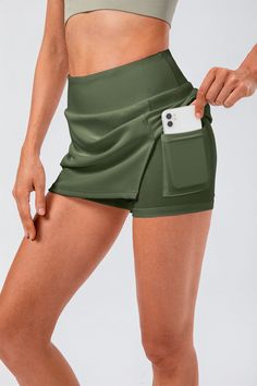 74% Nylon. 26% Spandex 4-way stretch. breathable and sweat-wicking High waisted design Crisp and stylish Wear resistant Liner shorts with side pockets 2-in-1: Built-in shorts for comfort & protection (shorts are not separate) Perfect for both sports activities and daily life 4-way Stretch Tennis Skirt With Built-in Shorts For Workout, Workout Nylon Tennis Skirt With Built-in Shorts, Casual Tennis Skirt With Built-in Shorts For Training, Green Skort With Built-in Shorts For Gym, High Stretch Athleisure Skort With Built-in Shorts, Green Gym Skort With Built-in Shorts, Green Sporty Tennis Skirt With Built-in Shorts, Sporty Green Tennis Skirt With Built-in Shorts, Stretch Tennis Skirt With Built-in Shorts For Gym