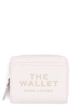 Signature logo detailing and richly textured leather distinguish an organized wallet perfect for storing your cards, cash and coins. Snap closure Two exterior slip pockets Two interior slip pockets; currency pocket; four card slots Lined Leather Imported Marc Jacobs Wallet, Compact Wallet, Best Wallet, Marc Jacobs Bag, Wallet Organization, Fabric Gift Bags, Wallet Accessories, Small Leather Goods, Leather Mini