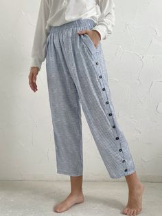 Casual Striped Loose Pants | justfashionnow Casual Straight Pants With Buttons, Spring Tapered Leg Bottoms With Button Closure, Casual Pants With Buttons And Loosely Fitted Hips, Casual Straight Bottoms With Buttons, High Waist Bottoms With Buttons And Relaxed Fit, Casual Trousers With Buttons, High Waist Relaxed Fit Bottoms With Buttons, Casual Wide Leg Pants With Buttons, Casual Ankle-length Pants With Buttons