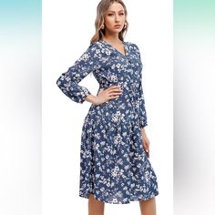 Gorgeous Floral Drop Waist Dress With V-Neck And Long Sleeves. This Year Florals Are A Huge Trend! A Floral With A Boho Vibe And You Are On Point For Summer/ Fall 2023! It Has A Cinch Waist For Perfect Fit, And Falls Mid Calf.. It Is Cotton Rich- So You Will Stay Cool And Comfy. Easy Breezy Wear And It Is Stunning.. 65% Cotton/ 35% Poly. Blue Floral V-neck Dress For Vacation, Blue Long Sleeve V-neck Dress For Spring, Elegant Blue Floral Print V-neck Dress, Casual Blue Flowy V-neck Dress, Blue Floral Print V-neck Midi Dress, Blue Floral Print Midi-length V-neck Dress, Blue Flowy Midi Dress With Surplice Neckline, Blue Floral Print V-neck Dress, Blue Long Sleeve V-neck Dress For Vacation