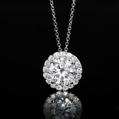 Ross-Simons - 2.00ct t. w. Lab Grown Diamond Halo Pendant Necklace in 14kt White Gold. 18". Indulge in big, beautiful sparkle for a nice price! Our fabulous pendant necklace features a stunning 1.70 carat round brilliant-cut lab-grown diamond center with a bright border of .30 ct. t. w. round brilliant-cut lab-grown diamonds all around. Crafted in polished 14kt white gold and suspended from a cable chain with a 2" extender. Lab-grown diamonds are identical to mined diamonds according to their op Luxury Platinum Necklace Gia Certified, Luxury Gia Certified Platinum Necklace, Formal Gia Certified Round Necklaces, Dazzling Diamond Necklace With Brilliant Cut Round Pendant, Exquisite Brilliant Cut Diamond Necklace With Round Pendant, Exquisite Diamond Necklace With Brilliant Cut Round Pendant, Gia Certified Luxury Round Necklace, Exquisite Gia Certified Necklace For Anniversary, Exquisite Gia Certified Wedding Necklaces