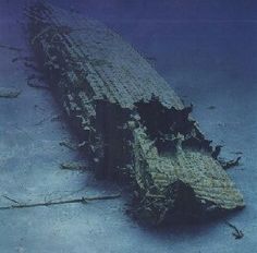 an old ship is submerged in the water