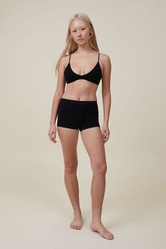 Seamless Triangle Padded Bralette Stretch Triangle Crop Top With Built-in Bra, Summer Low-cut Bra With Built-in Support, Fitted No-show Bra With Adjustable Straps, Seamless Triangle Top Nursing Bra For Summer, Summer Seamless Triangle Top Nursing Bra, Seamless Triangle Crop Top, Triangle Top Sports Bra With Removable Pads, Seamless Triangle Top Sports Bra, Seamless Solid Triangle Top Bra