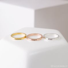 ♥ Custom Engraved Skinny Stacking Ring ♥ The most unique jewelry you can find, perfect gift for you and your loved one ♥ W H Y ∙ Y O U ' L L ∙ L O V E ∙ I T * It's dainty and can be worn every day * A special piece you'll treasure * High quality materials and attention to detail S K I N N Y ∙ R I N G * Material: High Quality Solid 925 Sterling Silver * Dimension: 2.5mm height * Finish: Sterling Silver ∙ 18K Gold ∙ Rose Gold * Personalized: This design can be customized with your Messages, Names, Minimalist Stackable Name Rings, Minimalist Custom Name Promise Rings, Personalized Modern Round Band Rings, Modern Personalized Round Band Rings, Everyday Minimalist Customizable Rings, Minimalist Everyday Rings With Name, Custom Name Rings For Everyday, Custom Name Rings For Everyday Wear, Modern Personalized Rose Gold Rings