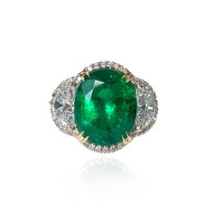 DETAILS: Emerald Weight: 5.83 CT Measurements: 12.3 x 10.3 mm Total Diamond Weight: 1.44 CTS (Half-Moon Diamonds 1.21 CTS, Round Diamonds 0.23 CTS) Metal: Platinum/18K Yellow Gold Prongs Ring Size: 7 Shape: Oval Color: Green Hardness: 7.5-8 Birthstone: May CUSTOM ORDER We customize high jewelry made with quality gemstones and diamonds. Please allow custom order 1-2 weeks. * Extensive collection of colored gemstones for you to choose from - Emerald, Ruby, Sapphire, Alexandrite (+ some collection Luxury Oval Emerald Ring With Brilliant Cut, Luxury Oval Emerald Ring With Prong Setting, Formal Yellow Gold Emerald Ring With Oval Shape, Formal Yellow Gold Oval Emerald Ring, Oval Yellow Gold Emerald Ring For Formal Events, Oval Emerald Ring In Yellow Gold With Halo Setting, Exquisite Oval Diamond Ring With 17 Jewels, Oval Halo Ring With 17 Jewels For Anniversary, Gia Certified Oval Emerald And Diamond Ring