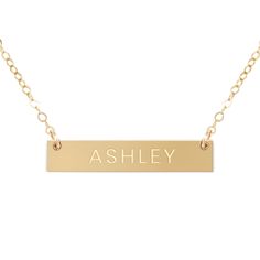 The daintiness of our personalized name necklace adds the perfect touch to any outfit! The simplicity of this custom necklace allows you to mix and match with a variety of styles to create an elegant look. Beautifully engraved, this customized piece makes the perfect gift for Valentine’s Day, Mother’s Day, Christmas and all special occasions and milestones!Material: 14k gold filled, anti-tarnish material (will not turn blue or green and will not stain skin)Bar Size: 1.25” W x 0.25” HChain Length Skin Bar, Gift For Valentine, Turn Blue, Gold Bar Necklace, Custom Necklace, Bar Necklace, Name Necklace, Mix And Match, Milestones