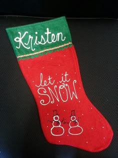 a christmas stocking that says, kristen let it snow