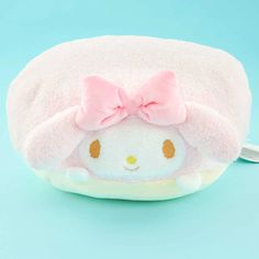 a hello kitty purse with a pink bow on it