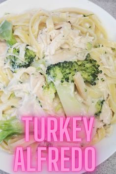 a white plate topped with pasta and broccoli covered in sauce next to a pink text that reads turkey alfredo