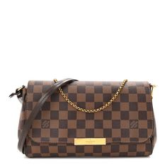 This is an authentic LOUIS VUITTON Damier Ebene Favorite MM. This stylish bag is crafted of durable Louis Vuitton checkerboard coated canvas in brown. This shoulder bag features a short polished brass chain strap, an optional dark brown leather shoulder strap, and a magnetic brass bar on the crossover flap that opens to a red fabric lining with a patch pocket. Favorite Mm, Louis Vuitton Damier Ebene, Authentic Louis Vuitton, Dark Brown Leather, Red Fabric, Stylish Bag, Brass Chain, Chain Strap, Patch Pocket