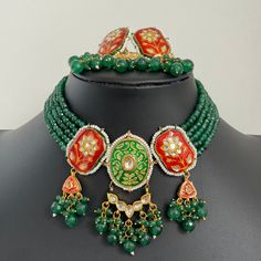 Green meenakari Kundan Necklace/Rajwadi Kundan choker/Indian necklace/Indian jewelry/Pakistani Jewelry/Punjabi Jewelry/bridal necklace Antique Classic Necklace With Gold Plating Regular Size And Adjustable Antique Necklace Set Ships from California and delivery in 2-5 business days in the USA.  The set includes a Necklace, Earrings, and Tikka Color, shades, and texture displayed may slightly vary from the actual product due to digital image limitations. We request you consider these minor variations. Please expect the possibility of some slight imperfections when buying handmade jewelry.  Please let me know if you have any questions. Arrives in a gift box. Thank you so much for visiting my shop. Luxury Meenakari Necklaces For Diwali, Cheap Festive Meenakari Jewelry, Luxury Green Meenakari Danglers, Bollywood Zari Work Choker For Festivals, Traditional Meenakari Jewelry Sets For Diwali, Kundan Meenakari Necklace For Diwali, Bollywood Kundan Meenakari Necklace For Diwali, Diwali Festive Kundan Necklace With Meenakari, Bollywood Temple Necklace With Meenakari For Eid