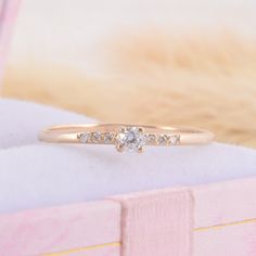 Small & dainty 14k yellow gold promise ring for her, Unique delicate minimalist womens promise ring, Small tiny gold cz engagement ring WE OFFER UNLIMITED PERIOD INSTALLMENTS PLAN This is a beautiful, stunning, feminine ring that works well for all occasions, styles, and ages. You will love it! Ring information: Main stone: White cubic zirconia Approximate size: 2.5mm Accent stones: Cubic zirconia Approximate size: 1.0mm (6 stones) Metal type: Gold Metal stamp: 14k Gold Installment Payments Delicate Promise Birthstone Ring, Dainty Promise Birthstone Ring, Minimalist Vvs Clarity Jewelry For Promise Ring, Delicate Birthstone Ring With Prong Setting, Dainty Brilliant Cut Diamond Promise Ring, Delicate Round Cut Diamond Ring For Promise, Delicate Jewelry With Diamond Accents For Promise Ring, Delicate Round Cut Diamond Promise Ring, Dainty Cubic Zirconia Birthstone Ring With Prong Setting