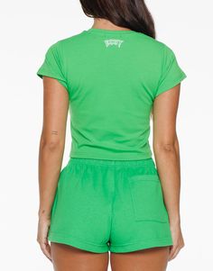 The Tour Baby Tee is a slim, super soft casual tee designed with style and athleisure in mind - Slim Crewneckline - Short sleeves - Tour Fabric Print - Slim fit - Designed for high movement activities, as well as leisure 93% Cotton. 7% Spandex Olivia wears a SmallShe is 160cm (5'3") tall with an 86cm (33") bust, a 67cm (25") waist and 88cm (32") hips. Casual Summer Workout T-shirt, Spring Sports Cropped T-shirt With Short Sleeves, Summer Athleisure T-shirt With Logo Print, Athleisure Stretch T-shirt With Logo Print, Relaxed Fit Cropped Cotton T-shirt For Sports, Trendy Stretch Cropped T-shirt For Sports, Fitted Casual T-shirt For Loungewear, Athleisure Stretch T-shirt For Spring, Casual Cropped Crew Neck T-shirt For Workout