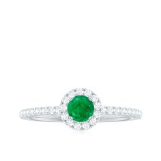 Product Details Style this Solitaire Ring with precious simplicity. This Engagement Ring is adorned with Round Shape Emerald Gemstone set in a Prong Setting with diamond Halo and beautifully crafted in hallmarked metal Product Information SKU SHP-RINGS112029645 Width 4 mm Height 6.5 mm Weight 1.20 gm (Approximate) EMERALD INFORMATION No.of Stones 1 Pieces Total Weight 0.50 Carat (Approximate) Dimension(approx) Round-5X5 mm-1 Pcs Color Green Cut Brilliant Shape Round Setting Type Prong-Setting Qu 18k Yellow Gold Ring, Emerald Gemstone, Emerald Ring, Yellow Gold Rings, Solitaire Ring, Halo Diamond, Prong Setting, Halo, Gold Rings