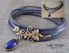 Trendy choker made of dark blue genuine leather, decorated with a bronze ornament and a semi-precious stone (Lapis lazuli). The leather strap is 105 cm long. It can be lengthened or shortened on request. Semi-precious stone: 1.5 cm Ornament: 6 cm You can see the matching earrings in our shop, as well as in the product photos. You can find the earrings at the following link: https://www.etsy.com/de/listing/1406085434/lapislazuli-ohrhanger-edelstein-ohrringe?click_key=dc73dea7fdf0b25977ecec727befd345281e3371%3A1406085434&click_sum=61851d74&ref=shop_home_active_9 ♥ Handmade with Love Every product in our shop can be customised for free. Send us a message! Vintage Blue Choker Jewelry, Brass Jewelry With Adjustable Cord For Gift, Brass Jewelry With Adjustable Cord As Gift, Adjustable Cord Brass Jewelry Gift, Gift Brass Jewelry With Adjustable Cord, Elegant Adjustable Cord Choker As Gift, Elegant Adjustable Cord Choker, Spiritual Blue Choker Jewelry, Vintage Jewelry With Adjustable Cord For Gift