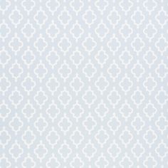 a blue and white wallpaper with an intricate pattern