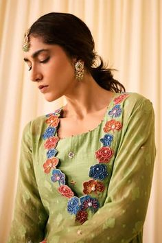 Green kurta with woven floral buttis, embellished by floral applique motifs and beads. Comes with palazzo, inner and dupatta. - Aza Fashions Designer V-neck Sets For Summer, Festive Green V-neck Sets, Green Anarkali Set With V-neck, Green V-neck Set For Diwali, Green Floral Embroidered Anarkali Set For Summer, Green Embroidered V-neck Kurta, Summer Green Anarkali Set With Floral Embroidery, Summer Green Floral Embroidery Anarkali Set, Summer Green Floral Anarkali Set