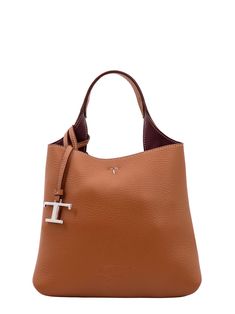 100% Leather Timeless Calf Leather Shoulder Bag, Calf Leather Satchel With Palladium Hardware, Timeless Calf Leather Shopping Bag, Timeless Tan Business Shoulder Bag, Pebbled Leather Tote With Palladium Hardware, Timeless Calf Leather Shoulder Bag For Shopping, Brown Pebbled Leather Bags With Palladium Hardware, Tan Pebbled Leather Top Handle Bag, Luxury Pebbled Leather Bag In Cognac