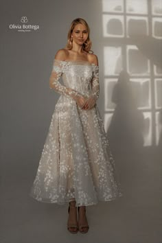 Long sleeve off-the-shoulder detachable bolero for strapless straight across neckline shimmery glitter floral lace midi skirt city hall wedding dress Brides Attire, Hall Wedding Dress, City Hall Wedding Dress, Convertible Wedding Dresses, Whimsical Princess, Princess Vibe, Floral Lace Wedding Dress, Olivia Bottega, Tea Length Wedding Dresses