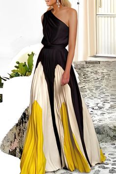 Elegant Summer Maxi Dress With Patchwork, Elegant Patchwork Maxi Dress For Summer, Chic Spring Dresses With Contrast Color, Elegant Summer Patchwork Maxi Dress, Sleeveless Patchwork Maxi Dress For Party, Elegant Patchwork Party Skirt, Summer Party Maxi Dress With Pleated Skirt, Elegant Beach Dress With Flared Skirt, Summer Party Maxi Dress With Full Skirt