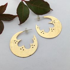 Gold Crescent Hoop Earrings In Brass, Unique Hammered Hoop Earrings, Gold Small Hoop Plug Earrings In Brass, Artisan Small Hoop Gold Earrings, Unique Crescent Pierced Earrings, Bohemian Small Hoop Yellow Gold Earrings, Unique Crescent Shaped Pierced Earrings, Gold Chandbali Hoop Earrings Handmade, Bohemian Yellow Gold Small Hoop Earrings