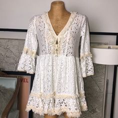 New Never Used Mint Condition Size S-M U Chic Crochet Trim Dress For Brunch, Chic White Mini Crochet Dress, Chic White Crochet Mini Dress, White Mini Crochet Dress For Vacation, Chic White Mini Length Crochet Dress, White Long Sleeve Crochet Dress With Lace Trim, White V-neck Dress With Lace Trim, Cream Crochet Dress With Lace Trim, White Fitted Crochet Dress With Lace Sleeves