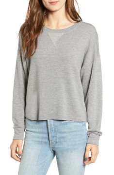 A versatile staple, this sporty pullover is made in a luxe blend of supersoft fibers and has a heathered finish that goes with everything. Crewneck Long sleeves 62% rayon, 30% cotton, 5% spandex, 3% polyester Machine wash, tumble dry Imported t.b.d. Gray Relaxed Fit Athleisure Sweater, Sporty Heather Grey Sweater With Ribbed Cuffs, Heather Grey Long Sleeve Sporty Sweater, Heather Grey Athleisure Top With Ribbed Cuffs, Comfy Everyday Knit Tops, Cozy Gray Sweatshirt For Layering, Comfy Knit Tops For Everyday, Comfy Knit Tops For Layering, Heather Grey Athleisure Tops For Fall