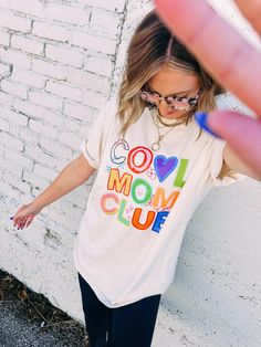 you asked and we delivered !! 💕🦋  let's just take moment here -- very own etta original cool mom club graphic tee.  ivory comfort colors tee loose fitting  UNISEX FIT Kendra's tts in tees is a m/l kendra is in XL here We always recommend sizing up in graphics  Sloan would get xl for denim styled but xx for comfort in leggings  50% cotton 50% polyester  do nottttttt size up if you don't like this super oversized! SO SO CUTE *will take 2-4 business days to fulfill due to the influx of orders -- thank YOU for being patient* Being Patient, Moms Club, Cool Mom, Comfort Colors Tee, Handmade Business, Cami Tanks, Denim Pant, Best Mom, Hat Hairstyles