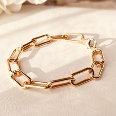 Chic, bold and beautiful!Perfect on its own or layered with other bracelets.Item Details:• This listing is for ONE(1) 14K gold-filled link bracelet.• All metal components are 14k gold filled.• Link Length 12mm, Width 6mmFitted chain bracelet - no extender. Wrist Measurement:1. Wrap a sewing tape measure around your wrist. Measure that length with a ruler.2. Round up to the nearest half-inch so that the bracelet has room to move around. For example, my wrist is 6.25". I round up half an inch to 6 Modern Chunky Bracelets For Everyday, Classic Yellow Gold Paperclip Bracelet With Chunky Chain, Classic Gold Paperclip Bracelet With Chunky Chain, Chunky Chain Link Jewelry For Formal Occasions, Everyday Chunky Chain Link Bracelet, Classic Chunky Jewelry As A Gift, Classic Chunky Jewelry As Gift, Formal Chunky Chain Link Jewelry, Gold Metal Bracelets With Paperclip Chain