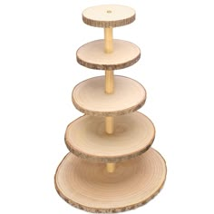 three tiered wooden cake stand on white background