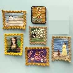 four crocheted squares with pictures of people and animals in them on a blue surface