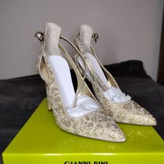 Item Is Brand New, Never Been Worn Size: 8.5m Color: Sandgold Smoke Free Environment Gold Heels With 4-inch Heel For Event, Elegant Gold Wedding Shoes, Gold Wedding Shoes With 4-inch Heel, Gold Embellished Heels For Party, Designer Gold Ankle Strap Heels, Elegant Gold High Heel Wedding Shoes, Gold Heels With Heel Strap For Evening, Gold Elegant Heels With Round Toe, Gold High Heels For Events