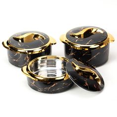 marbled black and gold canisters with lids