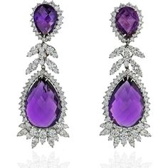 Indulge in the captivating allure of these exquisite Amethyst 18K White Gold 16.00cts Diamond Drop Earrings. Prepare to make a statement as you adorn your ears with these dazzling works of art. Crafted with meticulous attention to detail, these earrings boast a breathtaking design that seamlessly blends sophistication with modern elegance.The centerpiece of these earrings is the enchanting amethyst, radiating a rich and regal purple hue. With a weight of 16.00 carats, this gemstone captivates th Emerald Cut Diamond Ring, Beautiful Tiaras, Diamond Drops, Purple Hues, Emerald Cut Diamonds, Diamond Drop Earrings, Works Of Art, Estate Jewelry, Clip On