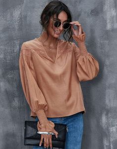 The EMES SHOP blouse is detailed with dainty eyelet detail. Features a v neck line. long sleeves. shirred cuffs. and oversized fit. Pair it with ripped jeans and sunnies for a comfortable look.MATERIAL:100%Soft Poly MEASUREMENTS:Product Length 24"-25"in Small | Bust & Hem Width : 37"-39"in Medium| Bust & Hem Width : 39"-41"in Large| Bust & Hem Width : 41"-43"in X Large| Bust & Hem Width : 43"-45"in Casual Lantern Sleeve Blouse With Relaxed Fit, Casual Long Sleeve Top With Smocked Cuffs, Tops With Smocked Cuffs For Fall Day Out, Smocked Cuffs Tops For Fall Day Out, Smocked Cuffs Tops For Day Out In Fall, Fall Tops With Smocked Cuffs For Day Out, Oversized Casual Blouse With Lantern Sleeves, Casual Fall Tops With Smocked Cuffs, Spring Casual Blouse With Lantern Sleeves