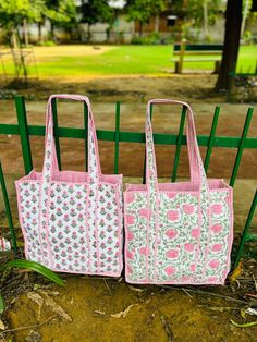 The Indian Hand Block Printed Cotton Quilted Women's Handbags from Rajasthan India. This Handbag is completely Indian Printed on good quality cotton. this cotton quilted shopping bag is totally unique and multi purpose. Use this for your grocery or as a travel bag. Perfect to suit all. Item :- Cotton Handbag Material: Quilted Cotton Fabric Color - as you like Pattern: Floral Block Print Style: Tote Bag, Handle Bag, Shoulder Bag Size in Inch:- Large Bag 16x15x5 inches  big bag 18x18x8 inches  Product Work: Printed & quilted Stitched Usage : Cosmetic, Make-up, Travel, Toiletries, Medicine, Accessories, Shopping and much more. Perfect for Beach Visits/ Quick Grocery runs/ Carrying Kids items/ Artist Paint book and Paints /Extra Bag Washable on Cold / Delicate wash Make a good Sustainable Gift Red Cotton Pouch Bag, Square Cotton Shoulder Bag As Gift Bag, Gift Shoulder Box Bag, Gift Box Shoulder Bag, Rectangular Cotton Shoulder Bag Gift, Square Cotton Shoulder Bag As Gift, Rectangular Cotton Shoulder Bag Perfect As A Gift, Cotton Shoulder Bag As Gift, Cotton Shoulder Bag For Gift