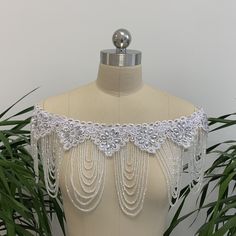 Color: white, ivory Size: One size fits all Exact Material:lace&Rhinestones Beading Brand: New never been used no label Transportation time in Europe and America: 10-18 working days, Other countries: 10-25 working days Elegant Beaded Lace For Wedding, White Pearl Bridal Necklace With Rhinestones, White Beaded Lace Bridal Accessories, White Crystal Embellished Bridal Necklace For Wedding, White Crystal Embellished Bridal Necklace, Beaded White Bridal Belt For Party, White Beaded Bridal Belt For Party, White Lace Embellished Bridal Accessories, Elegant Beaded White Wedding Dress