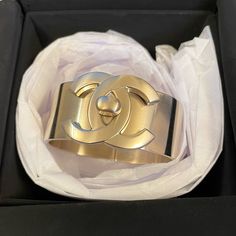 Authentic Chanel Gold Cc Turnlock Cuff Bracelet. Fine Hairline Scratches On Cuff From Regular Wear. Hardly Noticeable. Size S. Includes Box. Excellent Condition. *Please No Lowball Offers. Will Be Filming The Packing And Mailing Of Bracelet. Final Sale. Luxury Chic Yellow Gold Cuff Bracelet, Chanel Cuff Bracelet, Vintage Chanel Bracelet, Luxury 17-jewel Bangle Cuff Bracelet, Luxury Gold-plated Yellow Gold Cuff Bracelet, Jewelry Chanel, Chanel Jewelry, Designer Jewelry, Womens Jewelry Bracelets