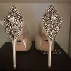 Badgley Mischka | Shoes | Badgley Mischka Ivory Pep Toe Pumps | Poshmark Elegant Embellished Heels For Wedding, Elegant White Shoe Clips For Party, Elegant White Rhinestone Shoe Clips, Elegant White Shoe Clips With Rhinestones, Glamorous White Shoe Clips For Wedding, White Embellished Shoe Clips For Formal Occasions, White Glamorous Wedding Shoe Clips, Glamorous White Wedding Shoe Clips, Glamorous White Almond Toe Wedding Shoes