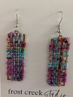 the earrings are made with multicolored beads