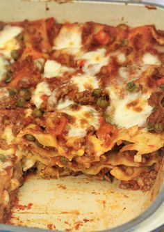 a casserole dish with meat and vegetables in it on a plate, ready to be eaten