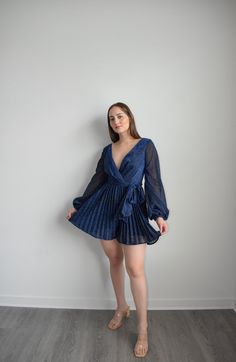 Navy Dress Romper Elegant Belted Mini Dress For Party, Glamorous Spring V-neck Party Dress, Cocktail V-neck Belted Mini Dress, Glamorous Spring V-neck Dress For Parties, Glamorous V-neck Dress For Spring Party, Chic Long Sleeve V-neck Dress For Evening, Chic Long-sleeve V-neck Dress For Evening, Glamorous Long Sleeve V-neck Dress For Date Night, Glamorous Long Sleeve V-neck Dress For Evening